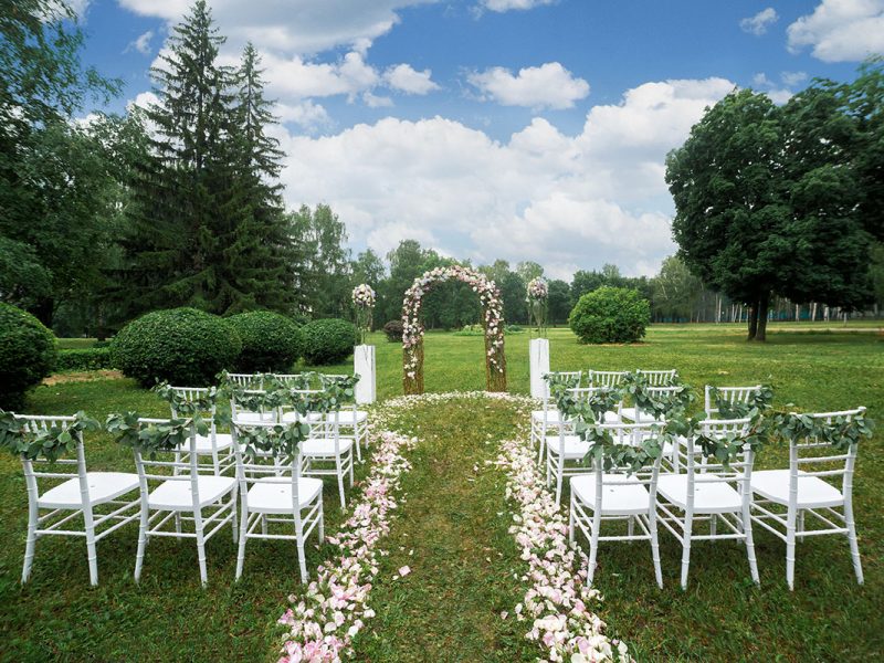 beautiful wedding ceremony in the garden with chairs